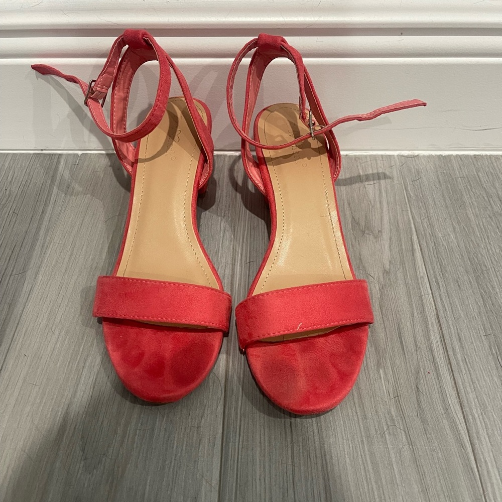 Pink chunky heels with ankle strap. Size 8.5. Lightly worn. Very comfortable.